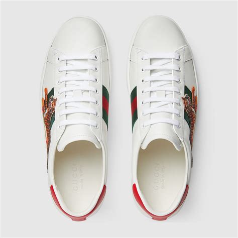 gucci ace leather blue sneakers|Gucci ace tiger sneakers.